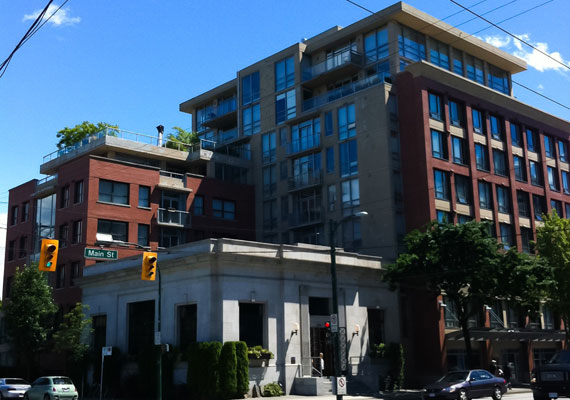 919 Station Street, Mount Pleasant. Concrete and brick construction and renovation of the existing Bank of Montreal building. 56 residential, 3 lofts + 3 commercial units.